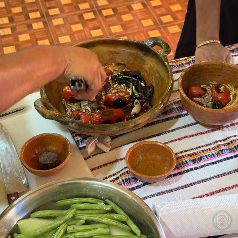 A Family participating in a private traditional Mayan cooking workshop at Lake Atitlán.